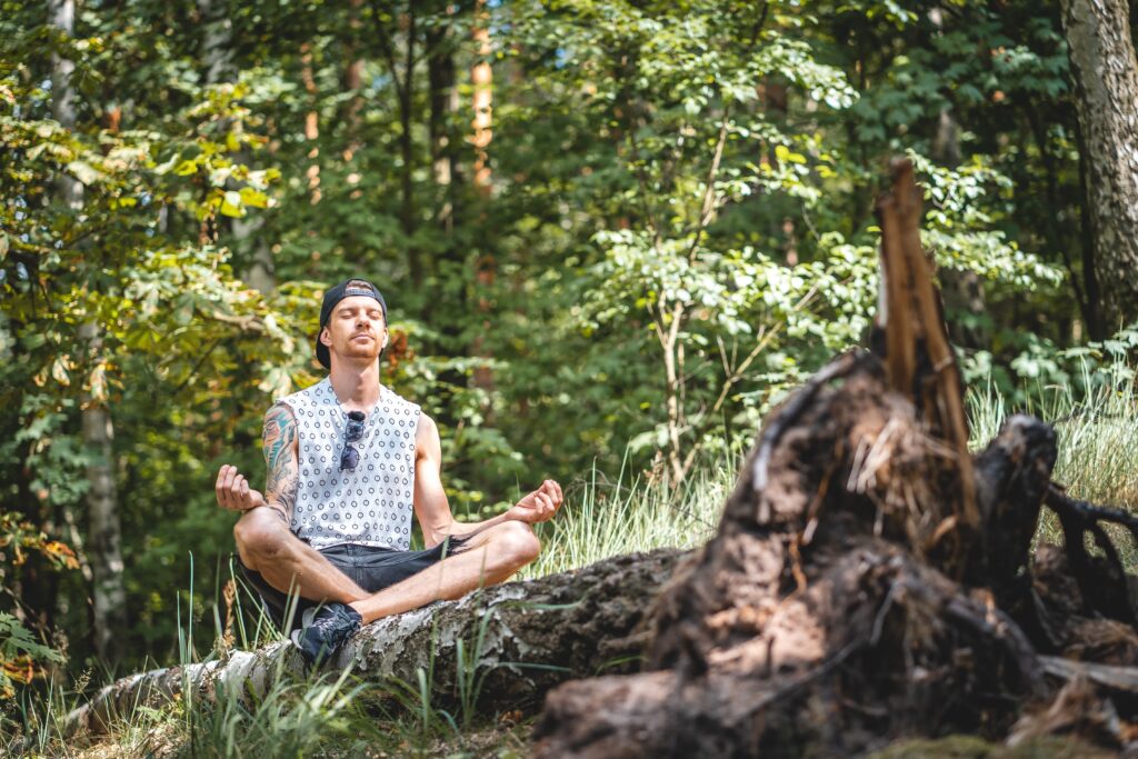 meditating-on-a-tree-log